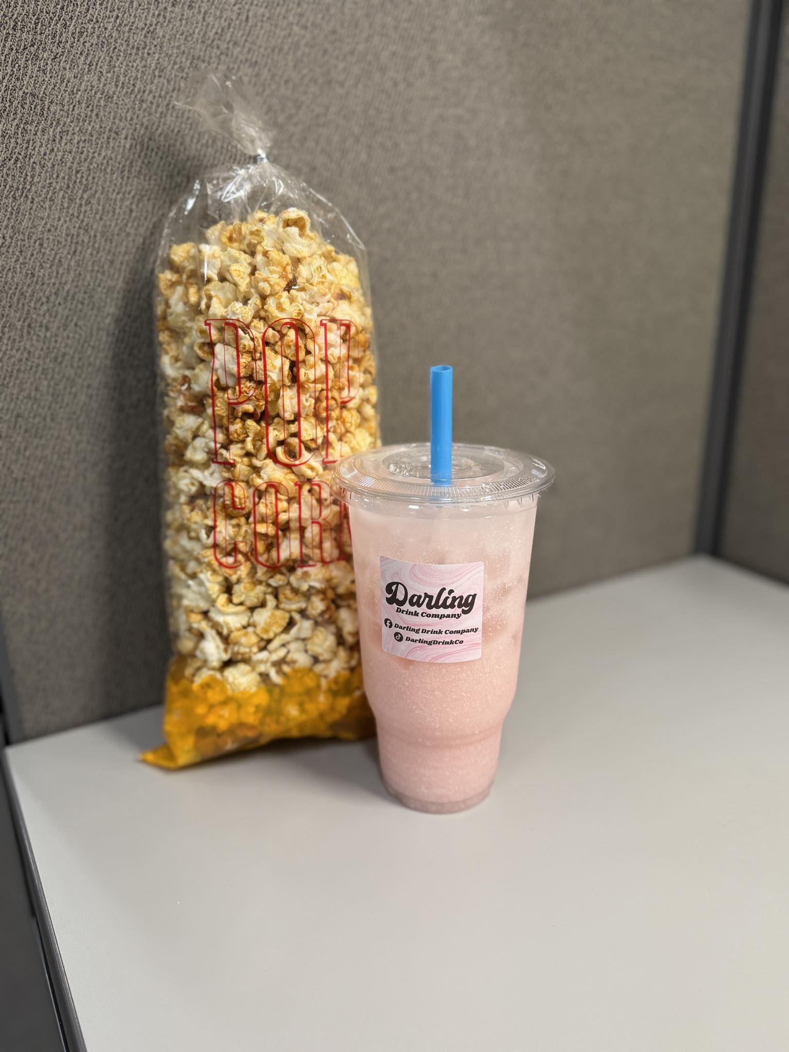 Pink drink with branded cup